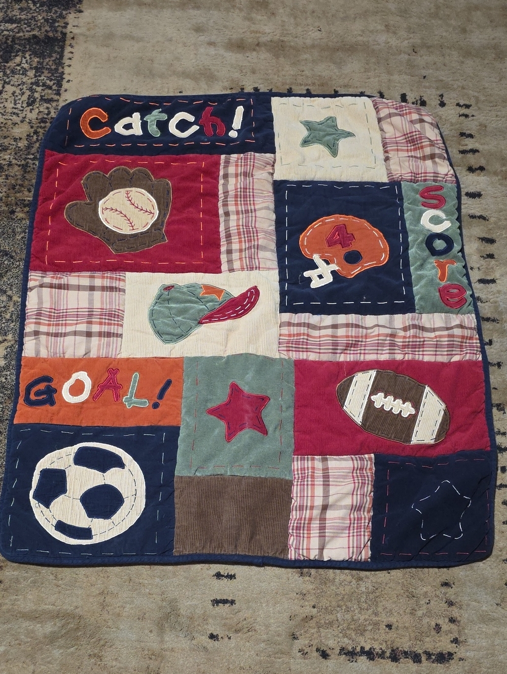 Kids Sports Patchwork Play Quilt - Navy, Red, Orange, Green, Cream.